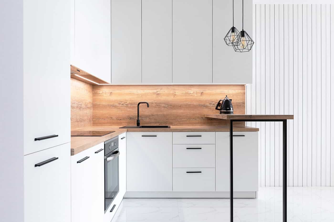 Garage storage cabinets with labeled totes stacked neatly