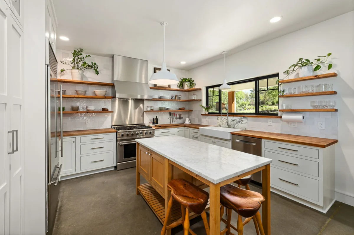 Open pantry shelves with uneven gaps that change the usable stack height